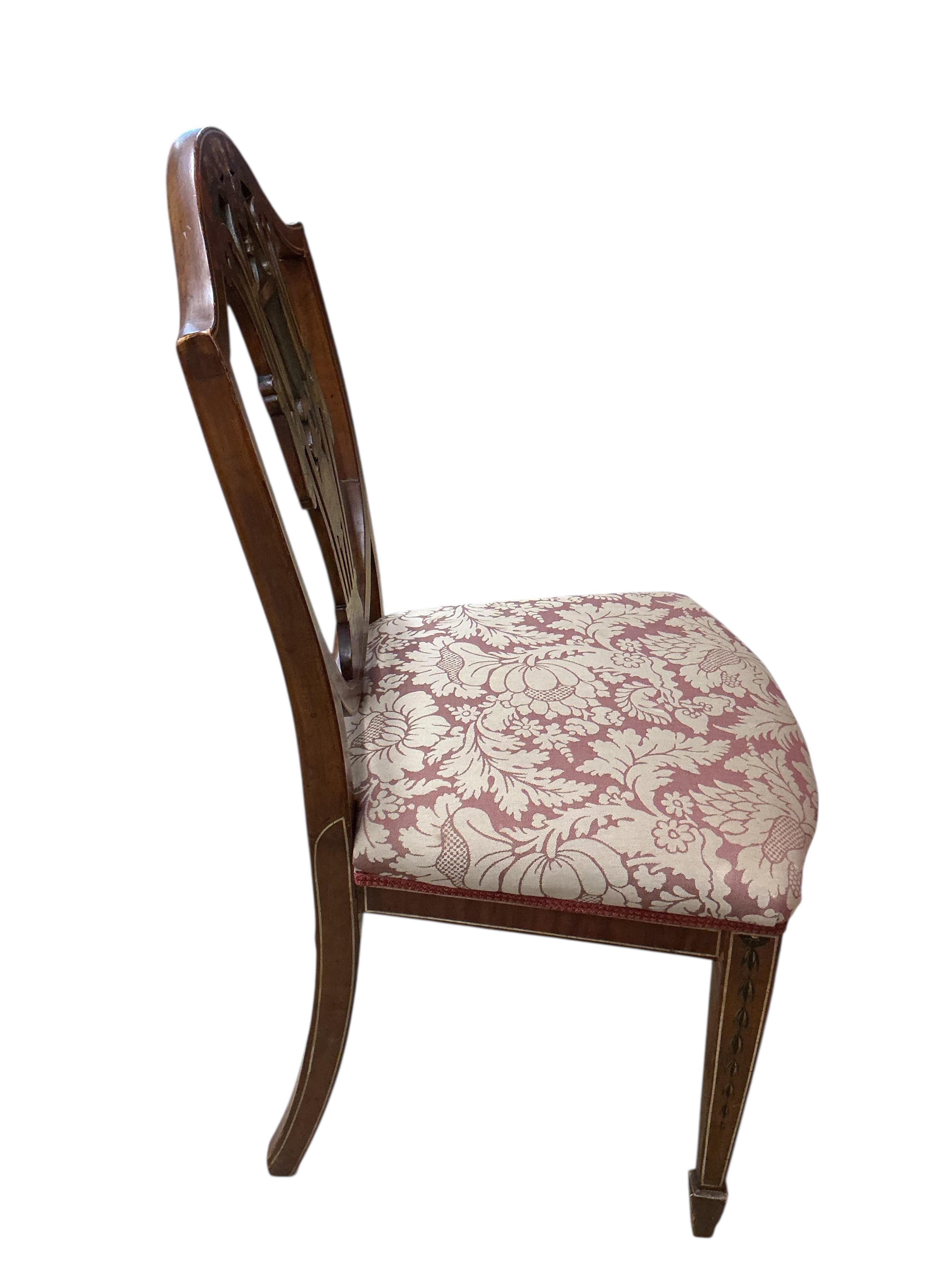 A set of four Edwardian, Sheraton Revival painted mahogany dining chairs, width 48cm, depth 40cm, height 90cm